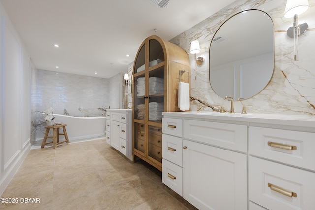 4545 S Atlantic Ave Unit 3604, Ponce Inlet, FL 32127 - bathroom with a soaking tub, vanity, and recessed lighting