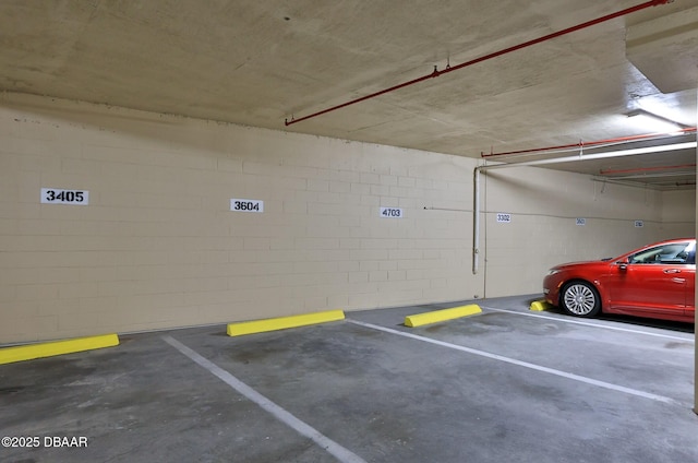 4545 S Atlantic Ave Unit 3604, Ponce Inlet, FL 32127 - parking garage featuring concrete block wall