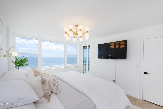4545 S Atlantic Ave Unit 3604, Ponce Inlet, FL 32127 - bedroom with a chandelier