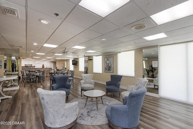 4545 S Atlantic Ave Unit 3604, Ponce Inlet, FL 32127 - living area with wood finished floors and a drop ceiling