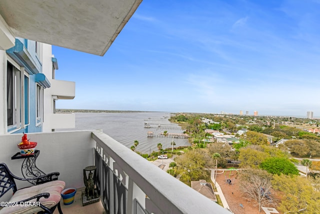 balcony featuring a water view