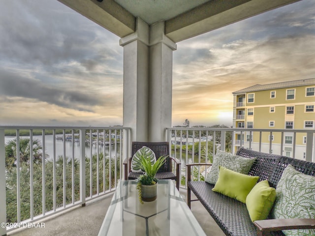 balcony at dusk with a water view