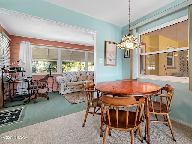 view of carpeted dining space