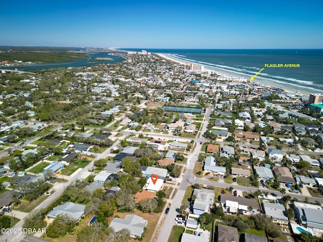 birds eye view of property featuring a water view and a residential view