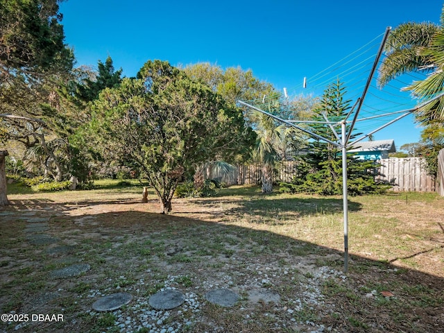 view of yard with fence