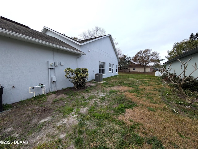 view of yard featuring central AC