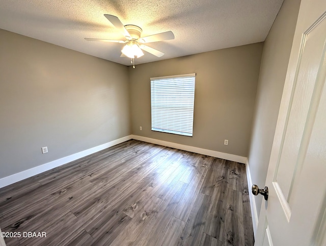 empty room featuring hardwood / wood-style flooring, a textured ceiling, and ceiling fan