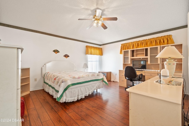 bedroom featuring ornamental molding, hardwood / wood-style floors, a textured ceiling, and ceiling fan