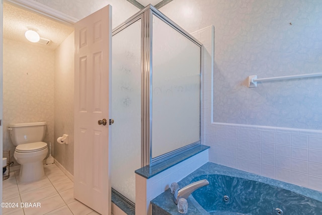 bathroom featuring tile patterned flooring, a textured ceiling, toilet, and plus walk in shower