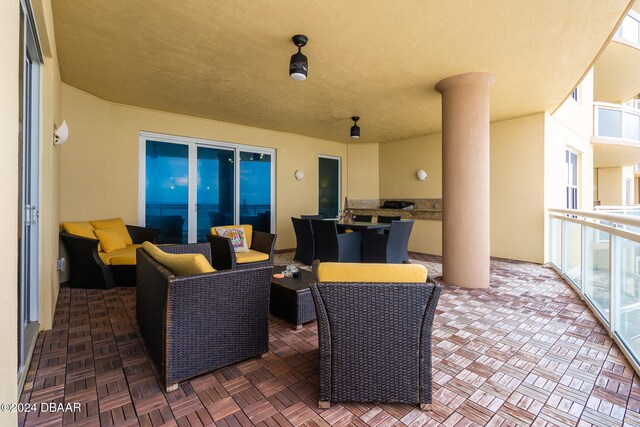 view of patio / terrace with a balcony