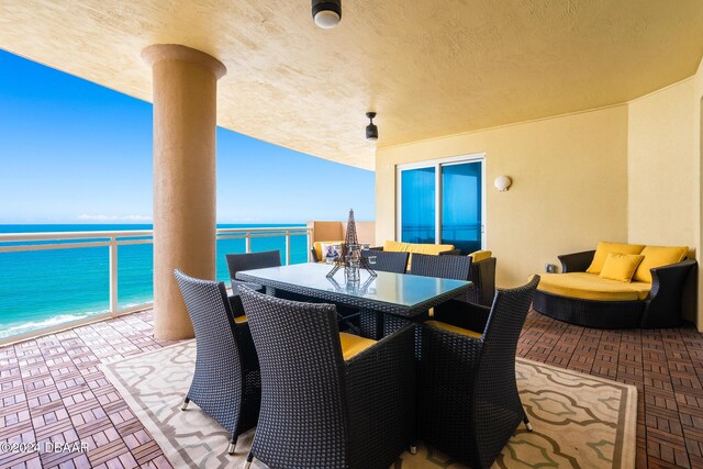 1925 S Atlantic Ave Unit 806, Daytona Beach Shores, FL 32118 - view of patio / terrace featuring a water view