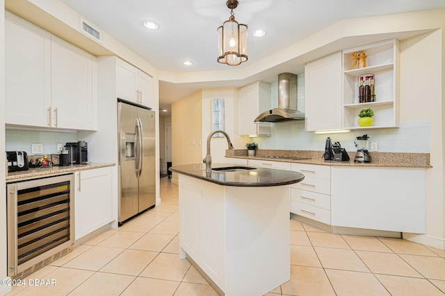 1925 S Atlantic Ave Unit 806, Daytona Beach Shores, FL 32118 - kitchen featuring stainless steel refrigerator with ice dispenser, beverage cooler, wall chimney exhaust hood, a sink, and tasteful backsplash