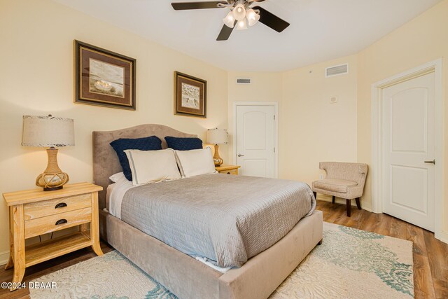 1925 S Atlantic Ave Unit 806, Daytona Beach Shores, FL 32118 - bedroom with wood finished floors and a ceiling fan