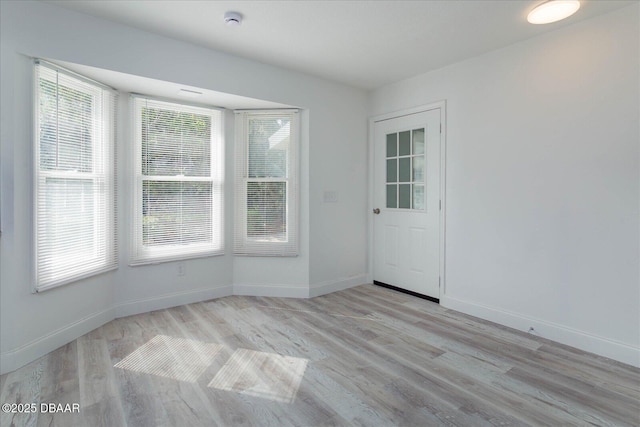 640 Old Treeline Trl, Deland, FL 32724 - spare room featuring light wood finished floors, baseboards, and a smoke detector