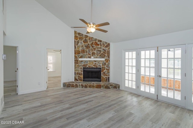 640 Old Treeline Trl, Deland, FL 32724 - unfurnished living room with a ceiling fan, wood finished floors, high vaulted ceiling, baseboards, and a fireplace