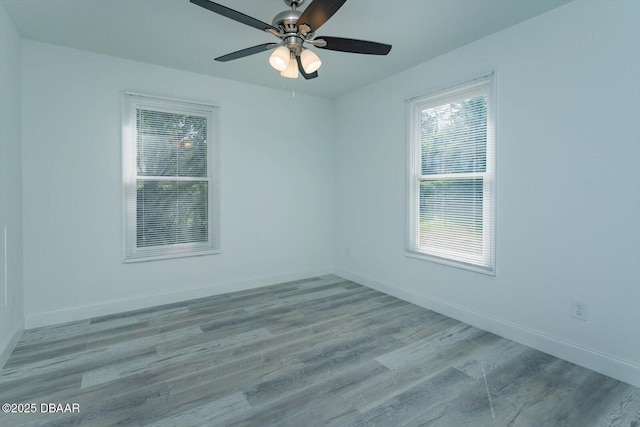 640 Old Treeline Trl, Deland, FL 32724 - spare room featuring wood finished floors, baseboards, and ceiling fan