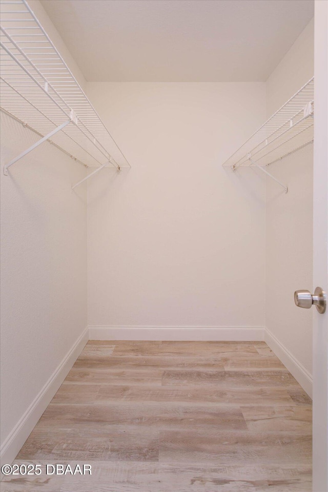 640 Old Treeline Trl, Deland, FL 32724 - spacious closet featuring wood finished floors