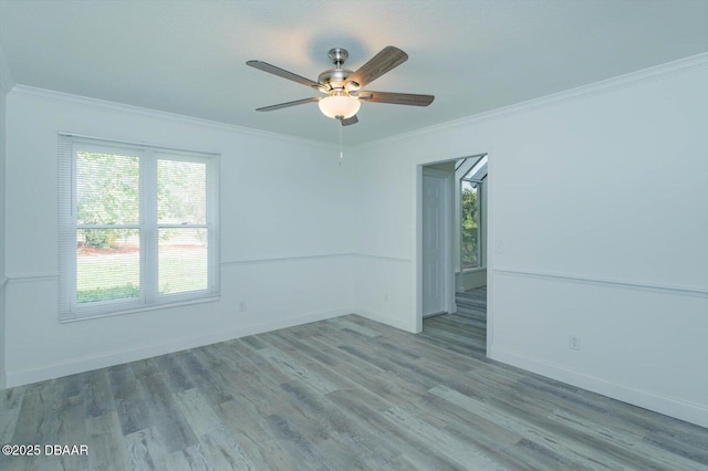 640 Old Treeline Trl, Deland, FL 32724 - unfurnished room with crown molding, a ceiling fan, baseboards, and wood finished floors