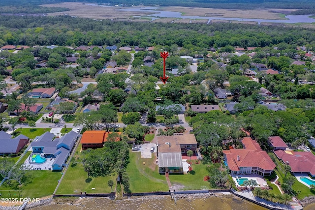 bird's eye view with a water view and a residential view
