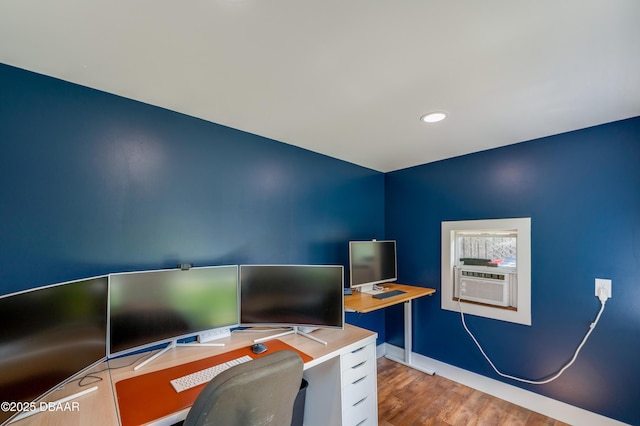 office featuring baseboards, cooling unit, recessed lighting, and wood finished floors