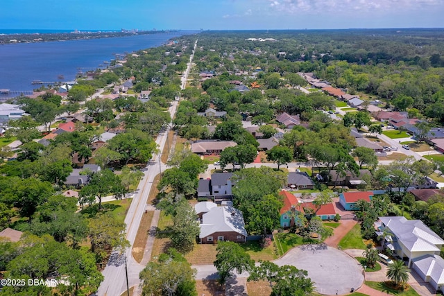 birds eye view of property with a water view and a residential view