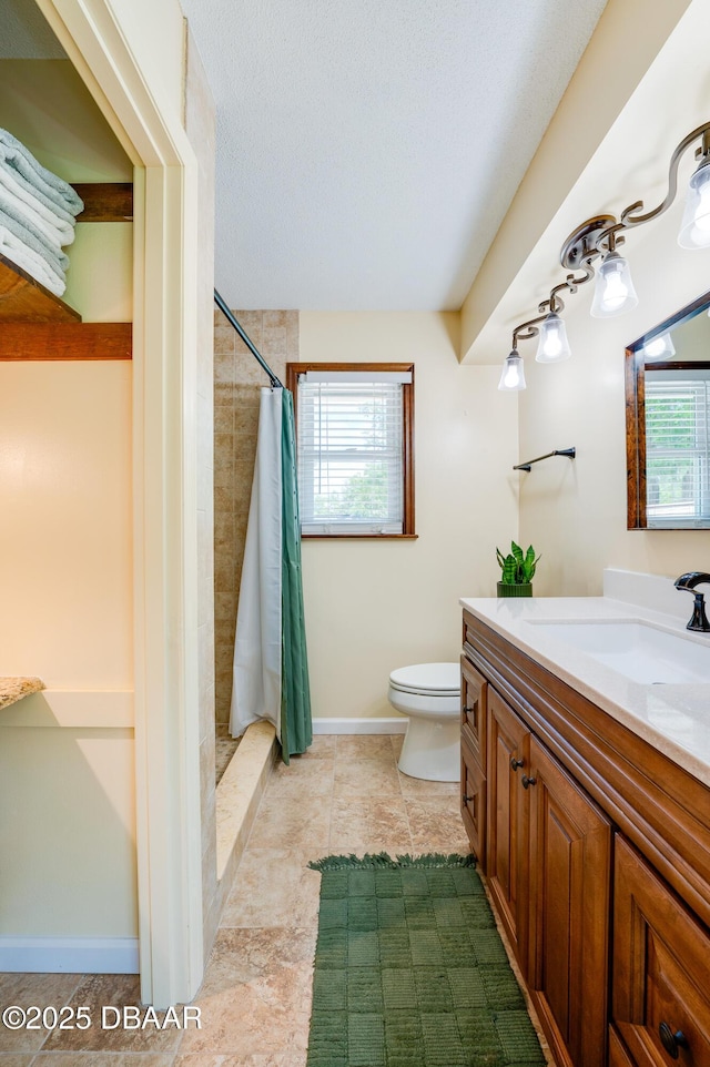 full bathroom featuring vanity, toilet, a shower with shower curtain, and plenty of natural light