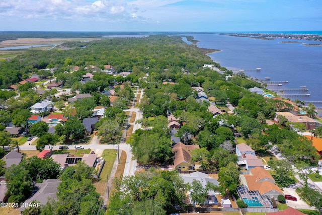 bird's eye view with a water view and a residential view