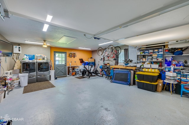 garage featuring washer and dryer