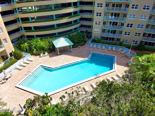 view of swimming pool with a patio