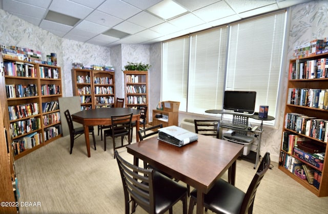 office with light colored carpet and a drop ceiling