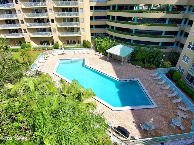 view of pool featuring a patio