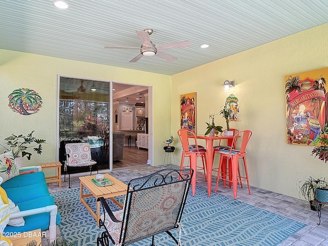 view of patio / terrace featuring an outdoor hangout area and a ceiling fan