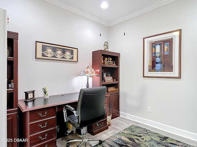 office with light wood-style flooring, crown molding, and baseboards