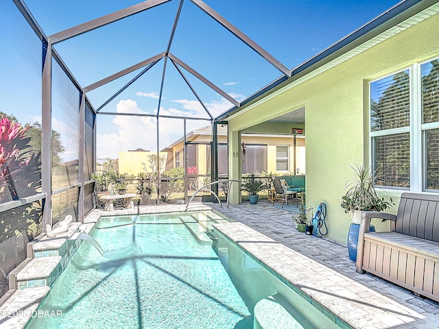 pool with a patio and a lanai