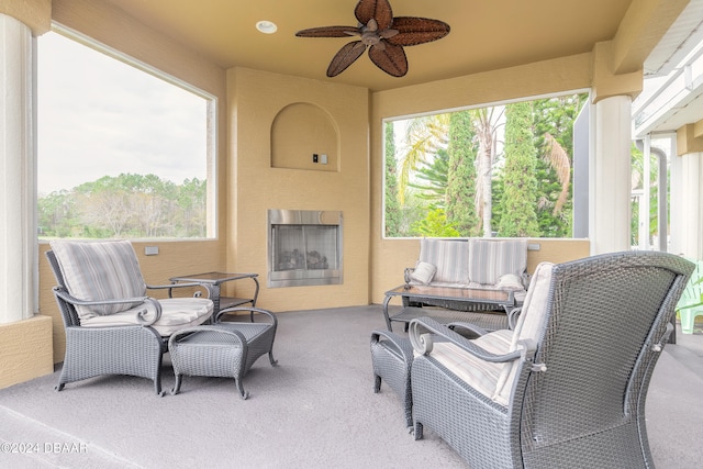 view of patio featuring ceiling fan and an outdoor hangout area