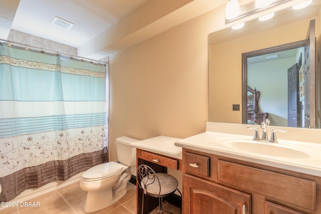 bathroom with tile patterned flooring, vanity, toilet, and a shower with shower curtain