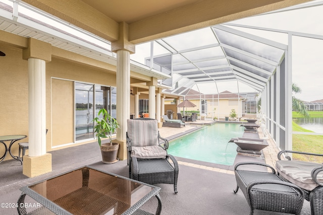 view of pool featuring a lanai and a patio area