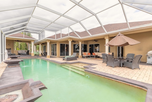 view of pool featuring outdoor lounge area, ceiling fan, and a patio