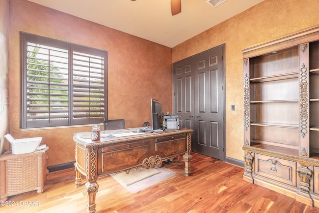 office area featuring wood-type flooring and ceiling fan