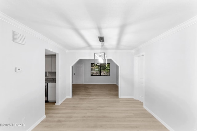 bonus room featuring baseboards and light wood-style flooring