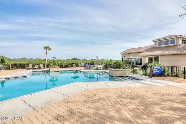 view of swimming pool featuring a patio area