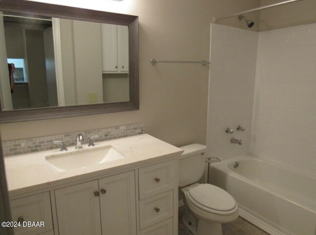 full bathroom featuring tasteful backsplash, vanity, shower / tub combination, and toilet