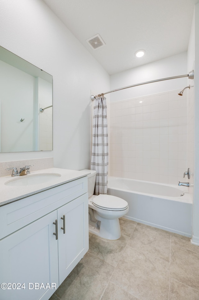 full bathroom with shower / bath combo, toilet, vanity, and tile patterned floors