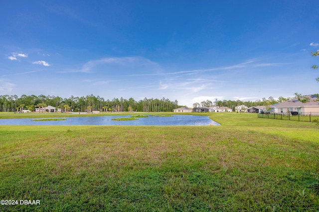 view of yard with a water view