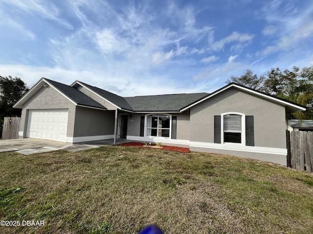 single story home featuring a garage, fence, concrete driveway, stucco siding, and a front yard