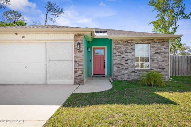 ranch-style home with a front lawn, an attached garage, fence, and roof with shingles