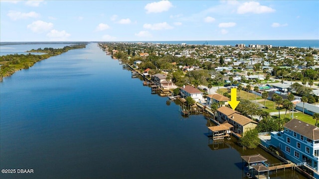 bird's eye view with a water view