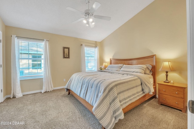 bedroom featuring light carpet, ceiling fan, and lofted ceiling