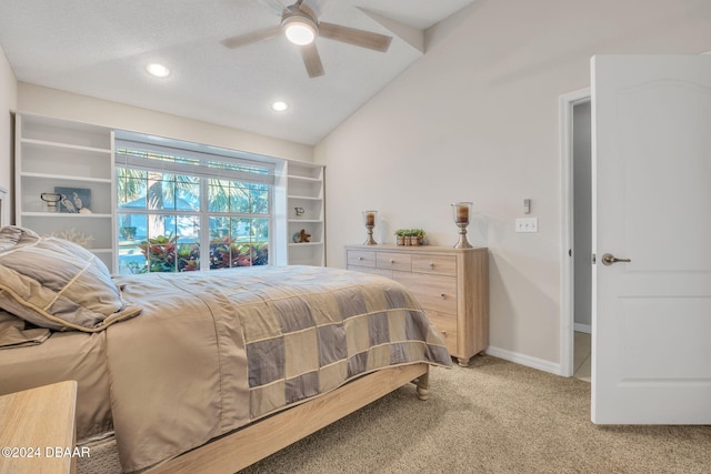 carpeted bedroom featuring ceiling fan and lofted ceiling