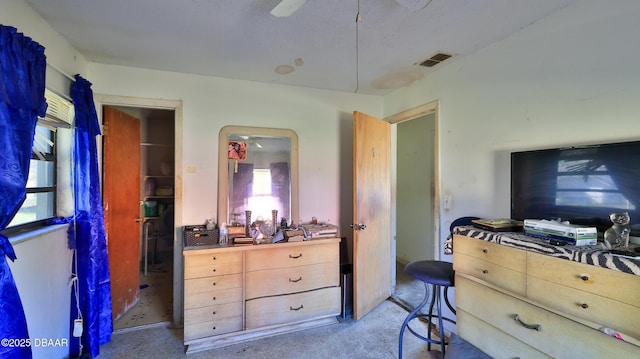 bedroom featuring carpet flooring and ceiling fan